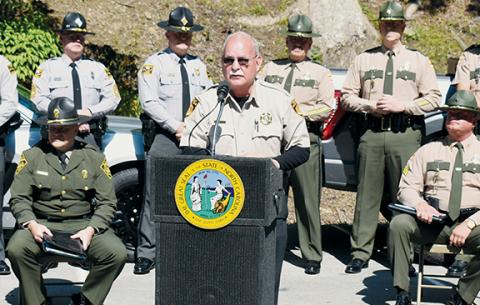 Curtis Cochran speaks at the Border-to-Border Tail of the Dragon Program Launch, which was held at Deals Gap Motorcycle Resort on June 13, 2023. Cochran was suspended from his duties as Swain County sheriff on Friday.