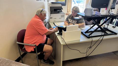 Randy Foster/editor@cherokeescout.com Andrews Mayor James Reid files to run for re-election Monday morning with Jennifer O’Dell, office assistant at the Cherokee County Board of Elections office in Murphy, assisting him with the paperwork.