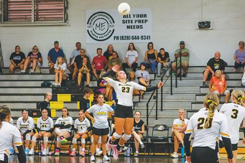 Cannon Crompton/ sports@cherokeescout.com Emma Hensley of Murphy goes up for a kill against Hiwassee Dam on Aug. 18. 