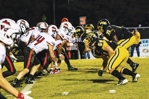 Cannon Crompton/sports@cherokeescout.com The Murphy and Andrews varsity football teams line up during their game last season on Oct. 25, 2024. Read more in the special Pigskin Preview section inside.