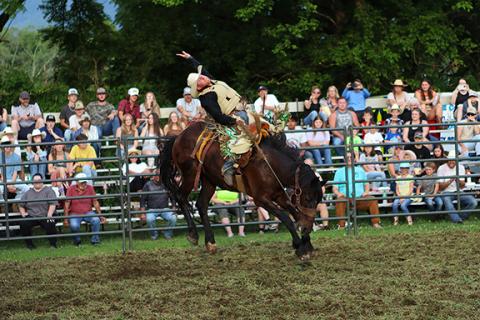 Cannon Crompton/sports@cherokeescout.com Kody Rinehart competes in the saddle bronc competition at the Andrews rodeo on July 5, 2024.