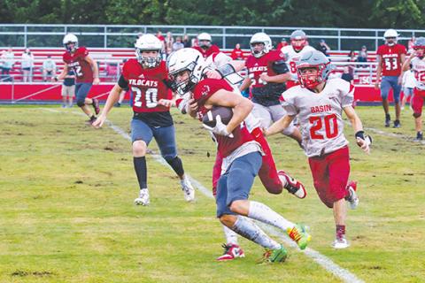 Cannon Crompton/sports@cherokeescout.com Kelby Waldroup of Andrews stiff arms a Copper Basin, Tenn., defender during their game on Aug. 8. 