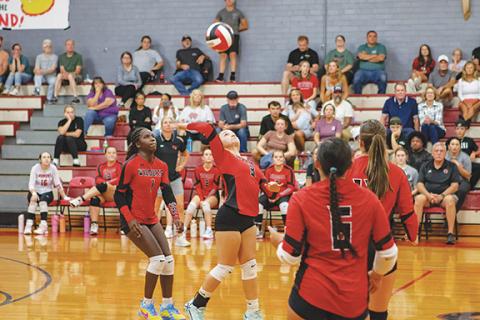 Cannon Crompton/sports@cherokeescout.com Mady Queen of Andrews look to hit to ball over the net against Murphy on Thursday night. 