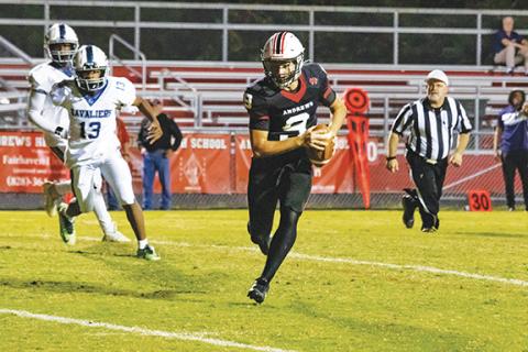 Cannon Crompton/sports@cherokeescout.com Andrews quarterback Brady McLelland rushes in a two-point conversion against Anderson, S.C., on Friday night.