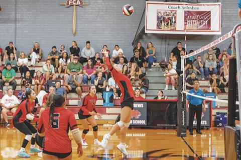 Cannon Crompton/sports@cherokeescout.com Mattie Mustin of Andrews goes up for a kill shot against Robbinsville on Thursday. 