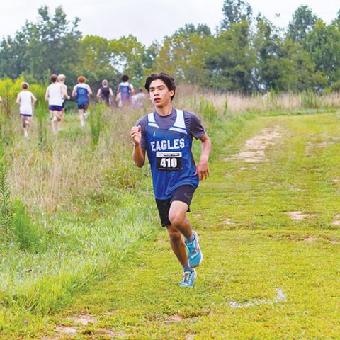 Cannon Crompton/sports@cherokeescout.com Oscar Page of Hiwassee Dam runs in the first cross-country meet of the season at Tri-County Early College in Peachtree on Aug. 23. 
