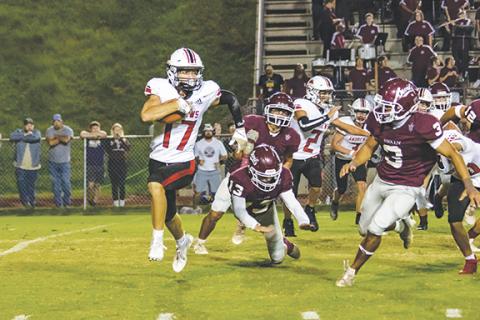 Cannon Crompton/sports@cherokeescout.com Logan Shuler of Andrews scrambles for yardage against Swain County on Friday night. 