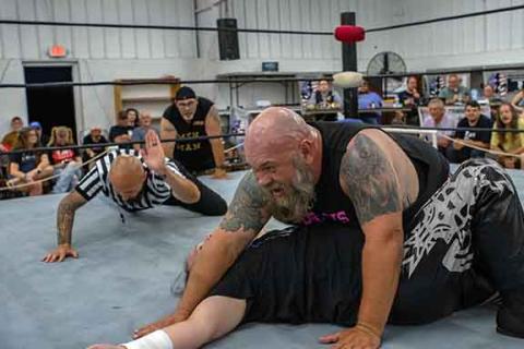 Cannon Crompton/sports@cherokeescout.com Killshot pins Billy Havoc in their ACWF match on Aug. 2. 