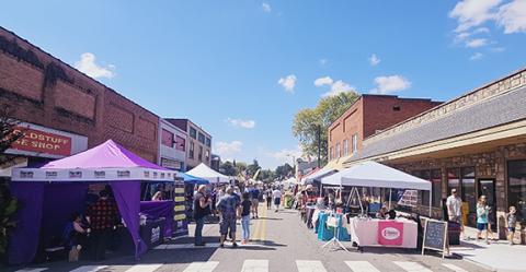 Nicole Wright/Staff Correspondent Crowds will again descend on Main Street for the Andrews Chamber of Commerce’s annual Oktoberfest from 11 a.m. to 5 p.m. Saturday. Last year’s festival was canceled due to Hurricane Helene. This photo from 2023 shows arts and craft vendors lining downtown.