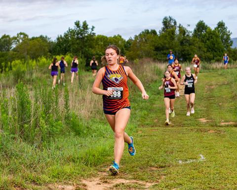 Cannon Crompton/sports@cherokeescout.com Fern Crayton of Tri-County Early College runs in her home meet on Aug. 23. 