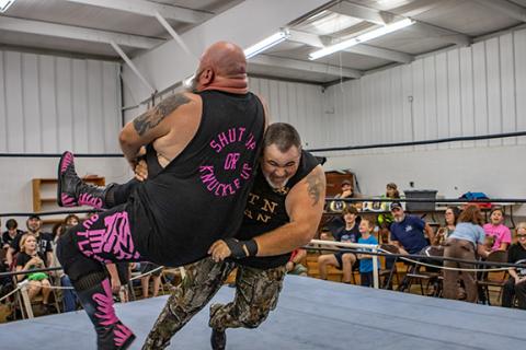 Cannon Crompton/sports@cherokeescout.com Mountain Man Jeremy Stiles hits Killshot with a spear before winning the match Saturday night.