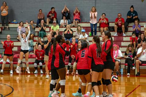 The Andrews varsity volleyball celebrate scoring a point against Highlands on Aug. 21. The Lady Wildcats are set to be in action this against Smoky Mountain at home Monday, then on the road against Robbinsville on Tuesday and at Hiwassee Dam Thursday.
