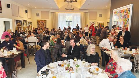 Photos by Randy Foster/editor@cherokeescout.com Above: A sold-out crowd had a great meal and shared good times during the Cherokee County’s Chamber of Commerce’s annual awards dinner on Sept. 9 at Hawkesdene in Andrews. Below: Folks representing the Cherokee Clay Food Alliance pick up their award.