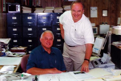 Frank Jones (seated) brought Chuck Van Gorder (right) in as a partner with his real estate business, Sam Jones & Son Real Estate & Income Tax Practice.