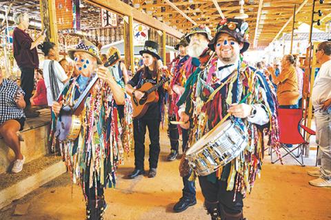 Photos by Michelle Bradbeer/Staff Correspondent John C. Campbell Folk School’s Morris Dancers brought colorful outfits, musical instrucments and traditional folk songs to the 49th annual Fall Festival on Saturday and Sunday in Brasstown. A packed house was on hand over two gorgeous autumn days to celebrate the kickoff of the folk school’s 100th anniversary celebration.