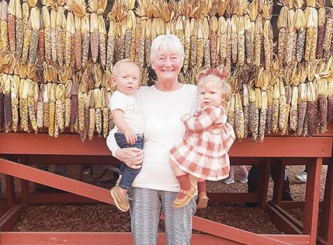 Nell Britt poses with children in this undated photo from her Facebook page.