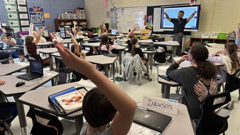 Randy Foster/editor@cherokeescout.com Chattanooga, Tenn., meteorologist Clay Smith (right) explains weather forecasting to a lively classroom at Peachtree Elementary School on Oct. 8.