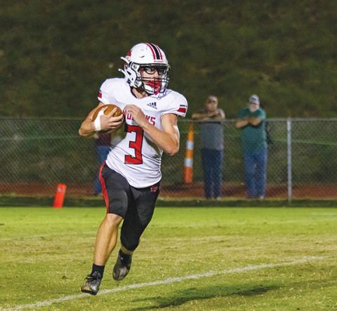 Cannon Crompton/sports@cherokeescout.com Phisher Baxter of Andrews runs the ball against Swain County on Sept. 19.
