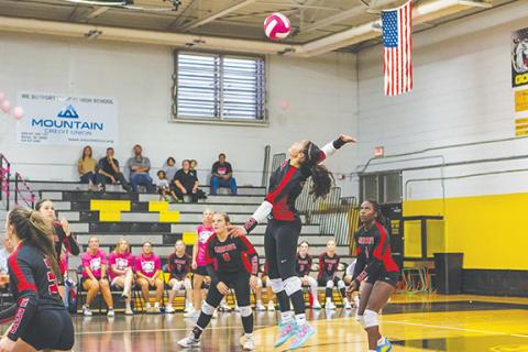 Cannon Crompton/sports@cherokeescout.com Chanteah Rattler of Andrews goes up for a spike against Murphy on Sept. 30. 