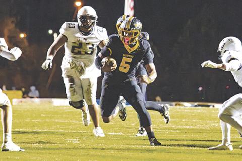 Cannon Crompton/sports@cherokeescout.com Murphy running back Cameron Clem rushes toward the end zone in Friday night’s game against Hayesville. 