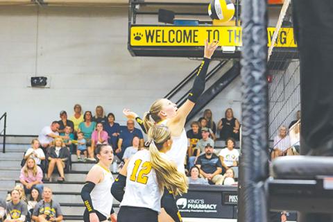 Cannon Crompton/sports@cherokeescout.com Murphy’s Ellie McClure knocks the ball over the net in their match against Hayesville on Sept. 16.