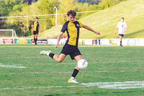 Cannon Crompton/sports@cherokeescout.com Jonathan Lamb of Murphy takes a shot against Andrews during the teams’ match Oct. 8.
