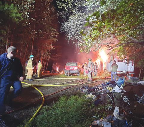 Photos by Anngee  Quinones-Belian/ Staff Correspondent Bellview blaze: Calls went out at about 7:15 p.m. Sept. 30 for multiple emergency personnel to respond to an address on Grape Thicket Road, where a mobile home was on fire that led to a second home burning.