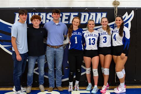 Cannon Crompton/sports@cherokeescout.com Hiwassee Dam volleyball and cross-country seniors were honored before the volleyball match on Oct. 7. From left are Avery Taylor, Abel Penland, Brock Hyde, Peyton Williamson, Brooklyn Hyde, Gracie Rhodes and Brinkley Payne.