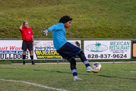 Cannon Crompton/sports@cherokeescout.com Tri-County Early College defender Julian Arvizu punts in their match against Swain County on Sept. 29.