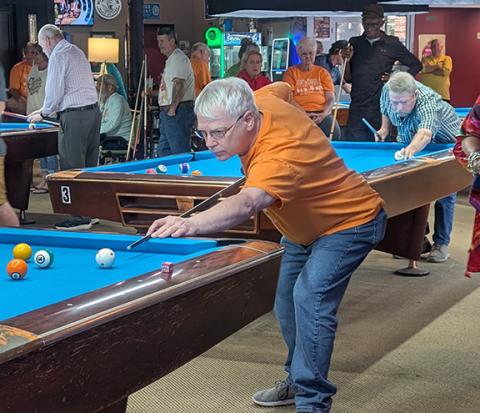Chris Faries/Contributing Photographer Brian Kearny competes in billiards during the N.C. Senior Games Finals in Raleigh.