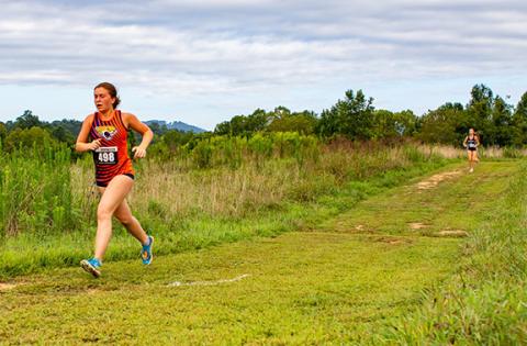 Fern Crayton of Tri-County Early College runs during her home cross-country meet Aug. 23. 