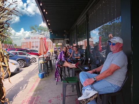 Photos by Samuel Jokich/ Staff Correspondent The Valley River Arts Guild host another fun Art Walk on Oct. 3 in downtown Murphy.  Local residents relax by enjoying refreshments and watching everyone walking around looking at the wares of vendors present.
