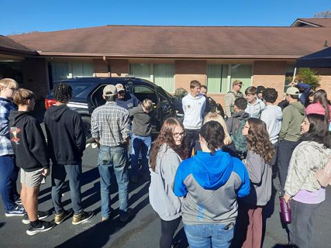 Photos by Anngee Quinones-Belian/Staff Correspondent  The Cherokee County Sheriff’s Office came to the third annual Cherokee County Schools CTE Career Expo with a police dog, vehicles and tools used in law enforcement. However, the real draw for youth seemed to be handcuffs.