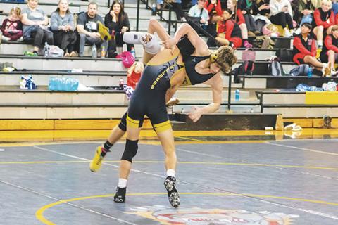 Cannon Crompton/sports@cherokeescout.com Braden Edwards of Murphy throws Mason Ray of Hayesville during their match on Jan. 17. 