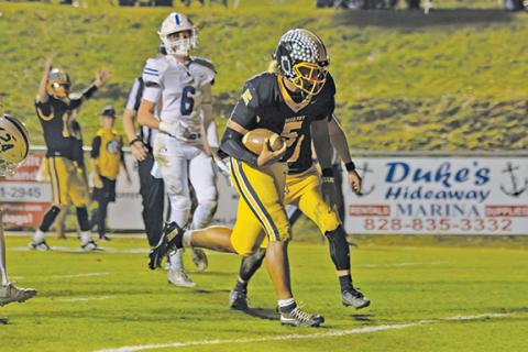 Cannon Crompton/sports@cherokeescout.com Murphy running back Cameron Clem finds the end zone in Friday night’s third-round state 2A playoff game against Community School of Davidson.