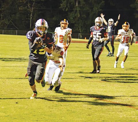 Cannon Crompton/sports@cherokeescout.com Andrews’ Kelby Waldroup runs the ball toward the end zone in the Wildcats’ game against Rosman on Oct. 10. 