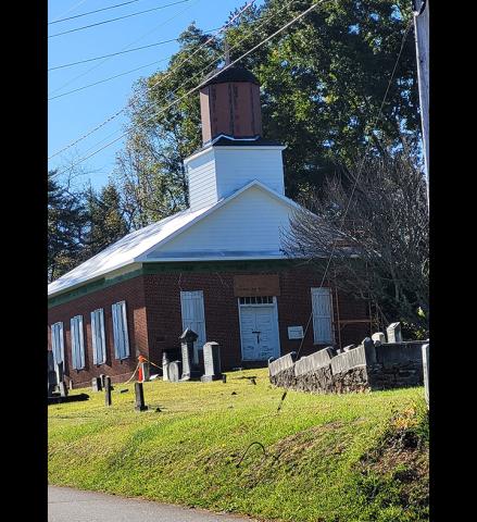 Donald Hale/Contributing Photographer Rising above downtown Murphy: Repairs are going well to the historic Harshaw Chapel on South Church Street.
