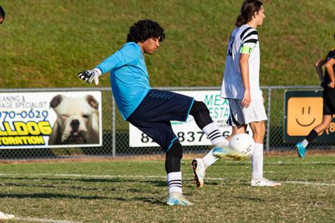 Cannon Crompton/sports@cherokeescout.com Tri-County Early College All-Conference goalkeeper Julian Arvizu punts against Murphy on Sept. 1.