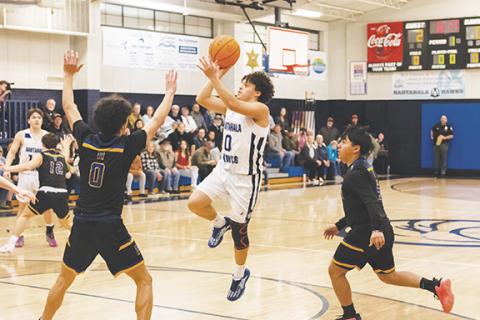 Cannon Crompton/sports@cherokeescout.com Fernando Trejo (No. 0) of Nantahala takes a shot against Highlands last season on Feb. 13.