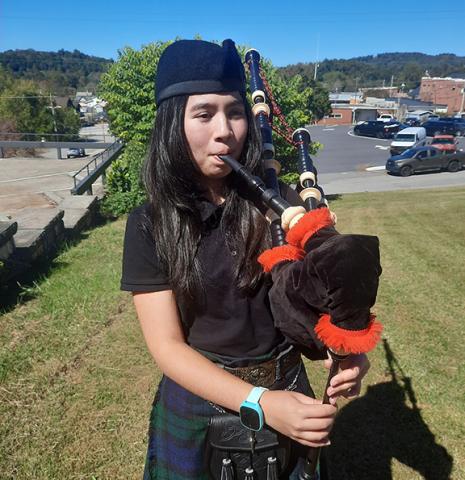 Photos by Anngee Quinones-Belian/Staff Correspondent  Emma Grace Campbell enjoys playing songs like “Amazing Grace” using bagpipes. The distinctive sound draws folks closer to wherever she is.