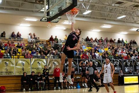 Logan Shuler of Andrews goes up for a dunk against Cherokee in the second round of last season’s  Big Smoky Mountain Conference tournament on Feb. 18. 
