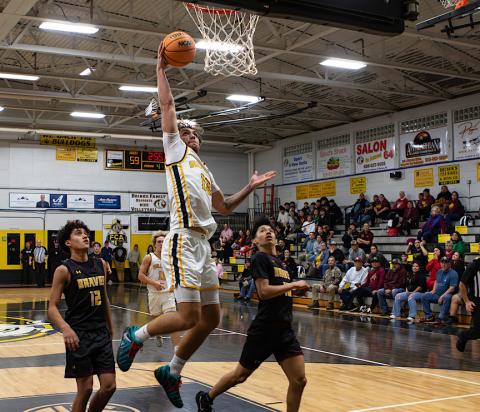 Cale Harger of Murphy goes up for a shot to help increase the lead against Cherokee.