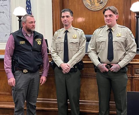 To protect and serve: Cherokee County Sheriff Dustin Smith (left) with new Deputies Christopher Baty and Michael Guffey.