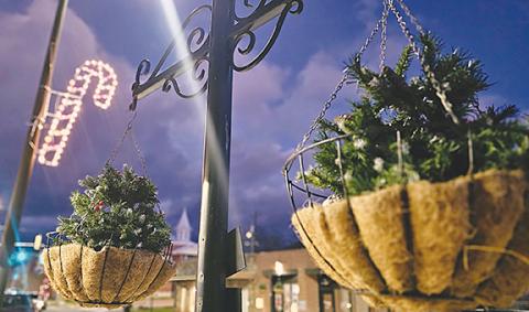 Nicole Wright/Staff Correspondent Downtown Andrews once again welcomes the winter season with baskets along with the town’s annual Christmas lights along Main Street.