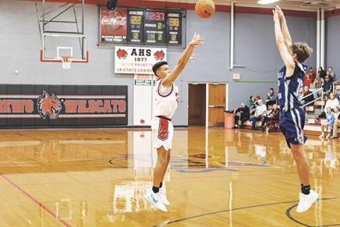 Cannon Crompton/sports@cherokeescout.com Braylen Maennle of Andrews shoots a 3-pointer against Nantahala on Dec. 9.