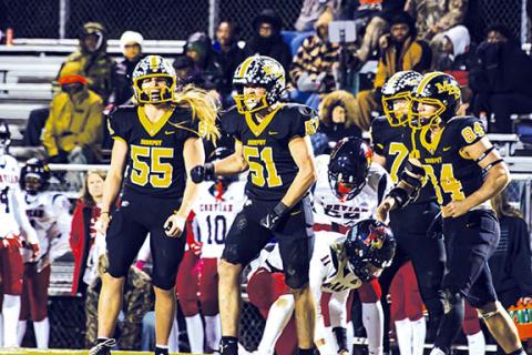 Cannon Crompton/sports@cherokeescout.com Landen Lape (No. 51) celebrates getting a sack against Corvian Community on Friday night. He is celebrating getting a sack alongside teammates Brody Orton (No. 55) and Camden Breazeale (No. 84), who also had sacks Friday night.