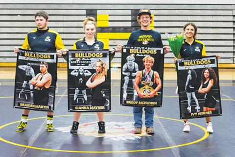 Cannon Crompton/sports@cherokeescout.com Before competing in duals on Dec. 9, Murphy varsity wrestling honored its four seniors. From left are Braiden Martin, Gianna Mayner, Brody McFaddin and Ivy Werner.