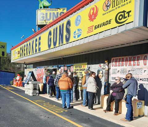 Photos by Anngee Quinones-Belian/Staff Correspondent  More than 400 folks showed up at the doors of Cherokee Guns in Murphy on Black Friday for some great deals on guns, ammo and accessories. No one appeared to be bothered by the wait, as cash registers were ringing.