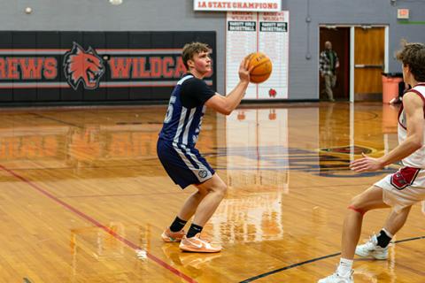 Cannon Crompton/sports@cherokeescout.com Jameson Grchan of Nantahala shoots a 3-pointer against Andrews on Dec. 9.