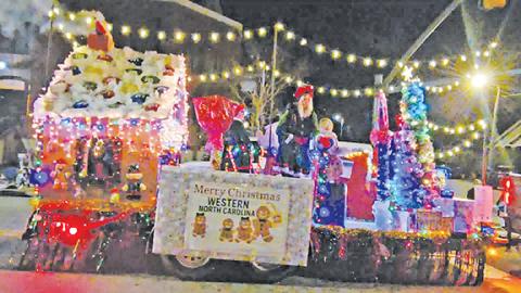 Photos by Nicole Wright/Staff Correspondent Andrews’ annual Christmas parade Saturday night was a treat with the theme of “A Gingerbread Christmas,” but the real show-stoppers were all the classic cars with exhaust and exaltation revving down Main Street downtown: Moog of Peachtree took first place in the Andrews Christmas Parade float competition.